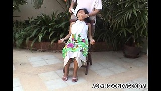 Asian Teen Tied Up and Hand Cuffed on a Chair